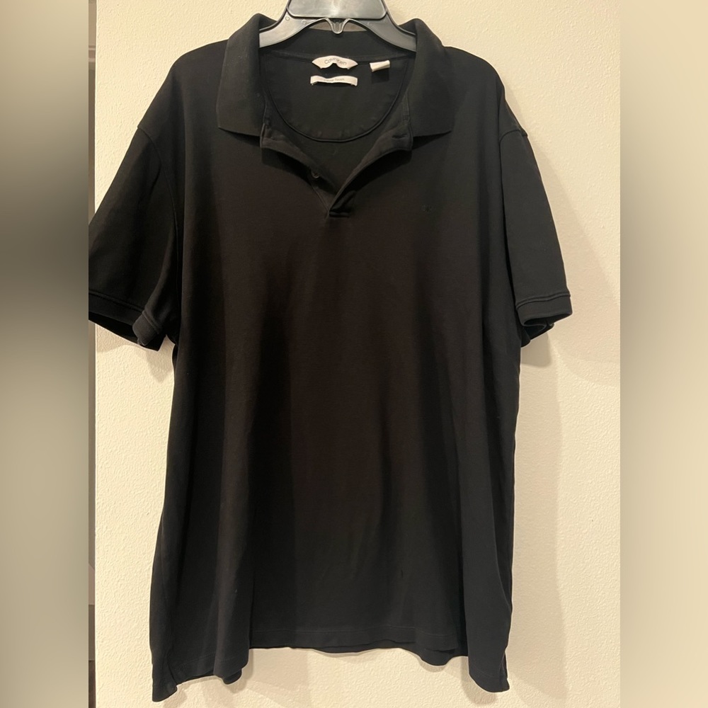 Black polo.
